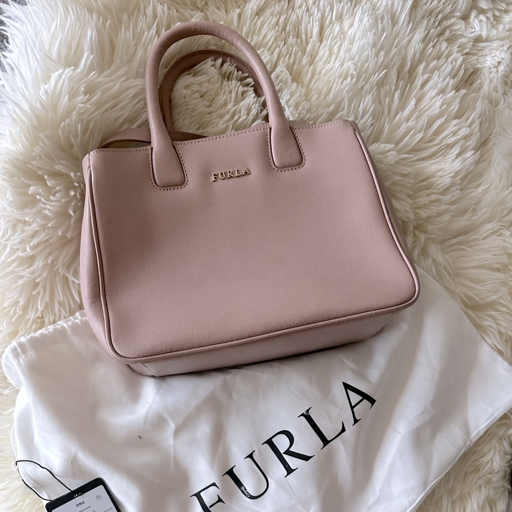 Beautiful piece by Furla , dusty rose color